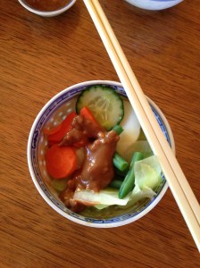 Serve veggies over rice with peanut sauce on top