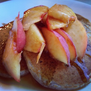 Buckwheat Pikelets with white peaches and maple syrup