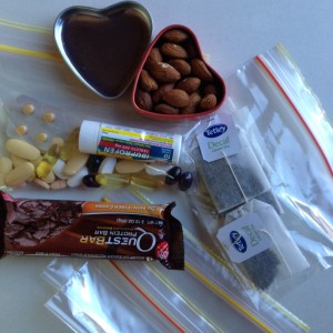 meds, supplements, protein bar, almonds, decaf tea bags