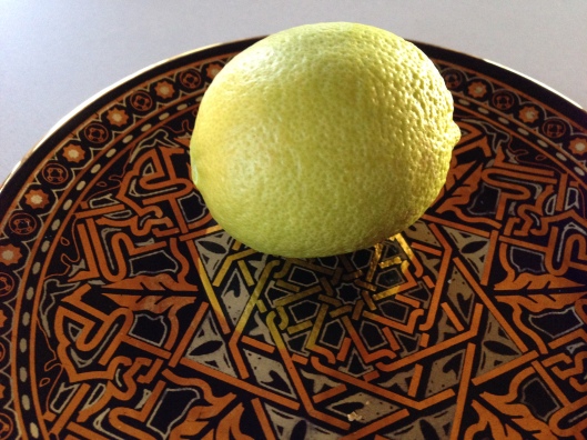 Lemon on plate with Moorish design