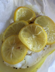 Cod baked with olive oil, salt, pepper, lemon